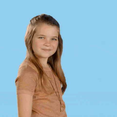 TV gif. Raegan Revord as Missy from Young Sheldon stands against a pale blue background. She leans back and points at the camera, her mouth slightly open, a smooth move meant to say, "Oh yeah."