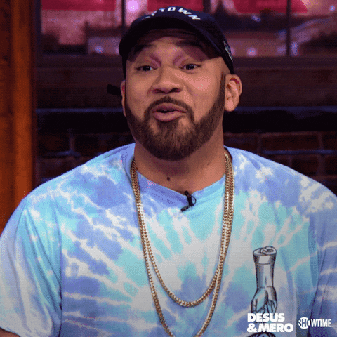 Celebrity gif. Creator The Kid Mero drops his jaw and raises his eyebrows in surprise.