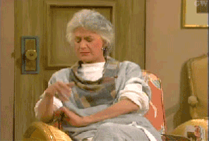 TV gif. Bea Arthur as Dorothy on Golden Girls drops her head to her hand in frustration.