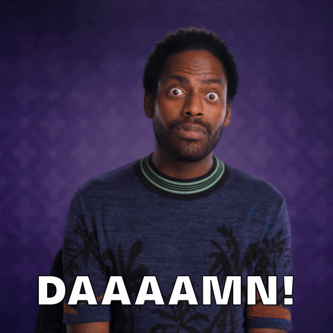TV gif. Baron Vaughn from History of Swear Words exclaims in wide-eyed shock in a purple shirt, with a long drawn-out, "Damn!" 