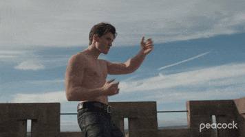 TV gif. Kieron Moore as Dimitri Belikov on The Vampire Diaries wears only a pair of jeans and no shirt. He quickly punches the air, showing the rippling muscles in his arm. 