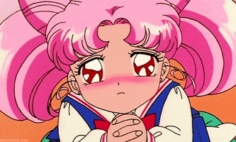 Anime gif. Chibiusa from Sailor Moon blushing, folding her hands, and looking up with shining eyes, as if she's begging.