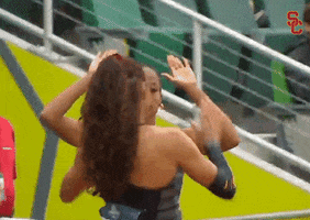 High Five Track GIF by USC Trojans