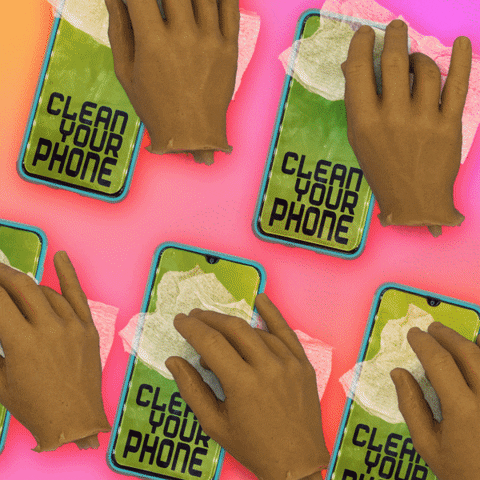 Digital art gif. Against a vibrant, blended pink and orange background, five hands completely detached from their arms wipe at turquoise iPhones with cleaning wipes. All the phones have green screens that read, "Clean your phone," which radiate with sparkles after each wipe.