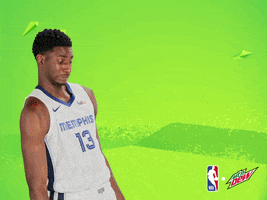 Ad gif. Jaren Jackson dances, doing a slow shoulder shimmy and raising his arm, against a Mountain Dew-green background where the words "work work work" pop up.