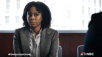 TV gif. Danielle Mone Truitt as Ayanna in Law and Order: Organized Crime. She's sitting in a meeting and she scoffs as she looks away and rolls her eyes in annoyance.