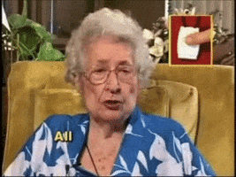 Ad gif. An old lady sits in a chair, nodding her head as she says, “All senior citizens should have Life Alert.” A small picture of a life alert with a finger on the button is next to her head.