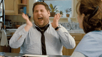 Jonah Hill freaking out in delight with jazz hands