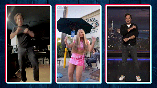 Two each of gray, white, and black shirts laying flat.