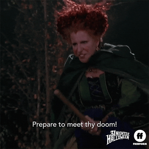 Movie gif. Bette Midler as Winifred in Hocus Pocus rides a broom as she reaches forward menacingly. Text, "Prepare to meet thy doom!"