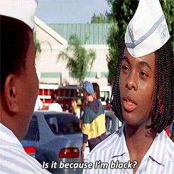 Movie gif. Kel Mitchell as Ed in Good Burger asks Kenan "Is it because I'm Black?"