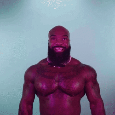 Video gif. A bald man with a bushy beard smiles at us excitedly and says, “let’s go!”