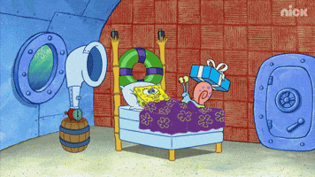 SpongeBob SquarePants gif. SpongeBob lies under the covers as Gary sits on his bed with a gift, and then the blanket flies off, and SpongeBob jumps up and blows a horn as confetti and balloons fly everywhere.