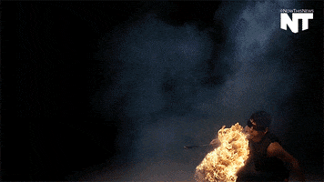 rotate fire breathing GIF by NowThis 