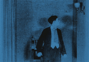 buster keaton and that is one reason tinting was so used. blue dark yellow light GIF by Maudit