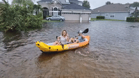 'We Got Uber Right Here': People Use Kayaks to Navigate Orlando's Flooded Streets
