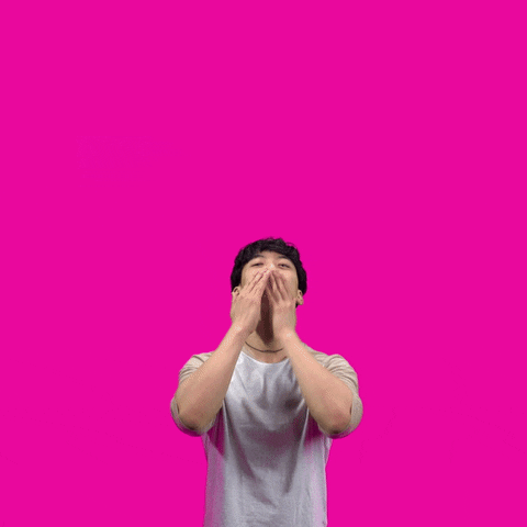 Digital art gif. Man seen from the waist up uses his hands to blow an over-the-top kiss toward us. The words "Happy Mother's Day" shoot toward us in white and pink 3-D letters, surrounded by pink hearts. Everything is against a bright pink background.