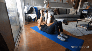 Dumbbell Hollow Flutter Kicks GIF
