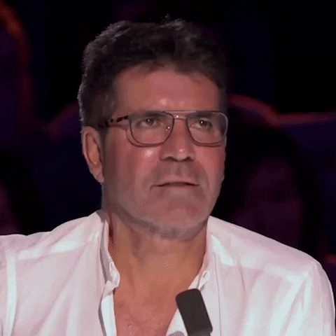 Simon Cowell Reaction GIF by Top Talent