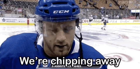 Chipping Away Ice Hockey GIF
