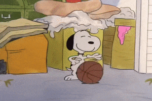 Peanuts gif. In front of a cluttered garage, Snoopy effortlessly dribbles a basketball around his body with his eyes closed and tosses it towards a net hanging from the house to make a perfect swish.