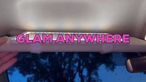 Using a lighted mirror for makeup in a car