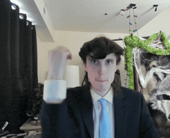 Rubbing Suit And Tie GIF