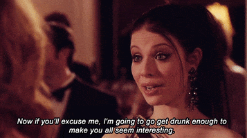 TV gif. Michelle Trachtenberg as Georgina Sparks in Gossip Girl is at a fancy party and says, “Now if you’ll excuse me, I’m going to go get drunk enough to make you all seem interesting.”