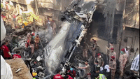 Footage Shows Rescuers Working Amid Plane Wreckage in Karachi