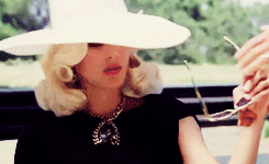 blonde girl wearing white hat