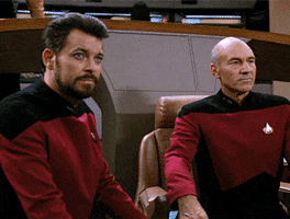TV gif. We push in on Sir Patrick Stewart as Captain Picard, lips tight in anger until he says "damn you."