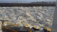 Tow Boat Struggles Through Thick Mississippi River Ice Near Clarksville
