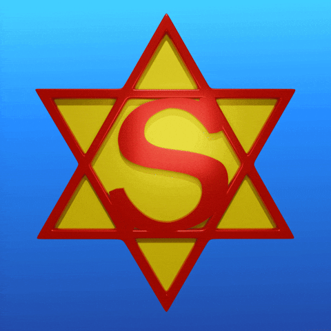 Digital art gif. The Star of David fashioned in 3D red and yellow with an S at the center, with a cerulean blue background, in apt resemblance of the Superman emblem.