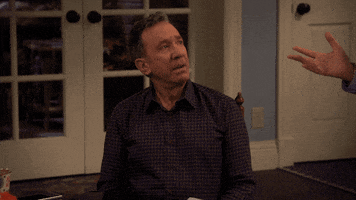 TV gif. Tim Allen as Mike Baxter in Last Man Standing, cringes judgmentally.