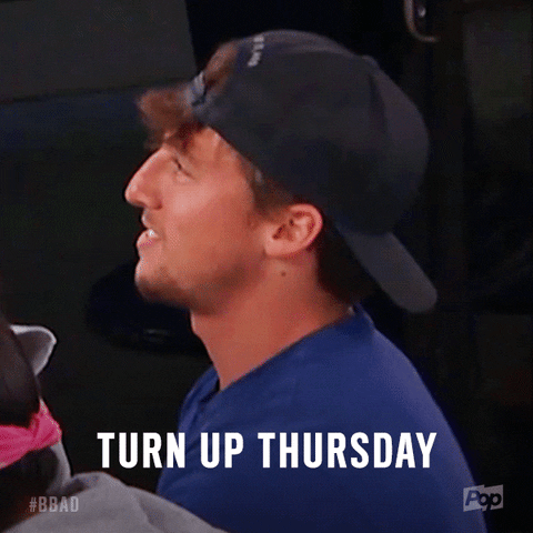 Reality TV gif. Brett Robinson on Big Brother: After Dark, wears a backwards hat and talks to someone off screen with a smile, saying, "Turn up Thursday."
