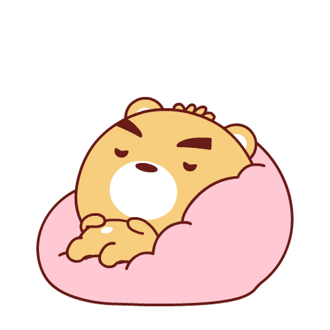 Kawaii gif. A light brown bear sinks into a cushion as it breathes heavily in its sleep with Zs float above its head. 