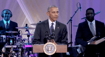 Barack Obama Shrug GIF by BET
