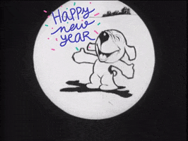 Digital art gif. A dog is clapping with both paws extended fully and a broad smile fills their face. Their head is tilted up and their eyes are closed in happiness and the text reads, "Happy new year!"