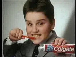 colgate brushing teeth GIF