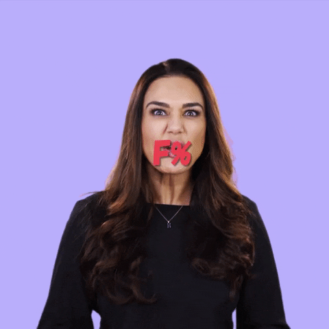 Video gif. Preity Zinta glares at us as she speaks angrily, a black bar over her mouth, with letters and numbers appearing on it to indicate censored swear words. She lifts an arm to swipe the bar away and it disappears with a red shockwave animation. 