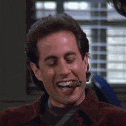 Giphy - jerry seinfeld laughing GIF