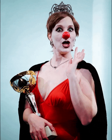 RedNoseCompany winner trophy red dress beauty pageant GIF