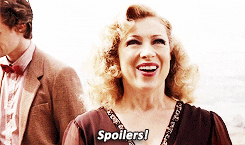 River song smiling and saying "spoilers".