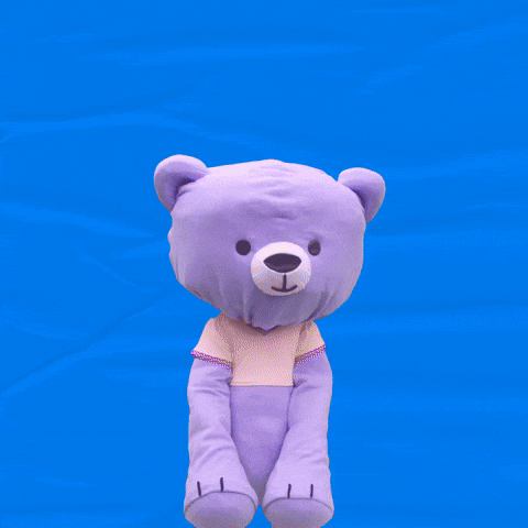 Video gif. Purple bear puppet looks at us and holds its paws up to cover its mouth. Text, “Whyyyyy??”