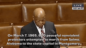 Political gif. Rep. John Lewis speaks on the floor of Congress. He stands in front of the podium and says, "On March 7, 1965, peaceful nonviolent protestors attempted to march from Selma, Alabama to the state capitol in Montgomery."