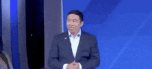 Democratic Debate Waves Hand GIF by GIPHY News