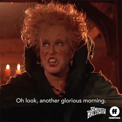 Disney gif. Bette Midler as Winifred Sanderson in Hocus Pocus, looks out a window, saying "Oh look, another glorious morning. It makes me sick!"
