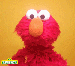 Sesame Street gif. Elmo looks at us and scratches his head with his hand on his hip. 