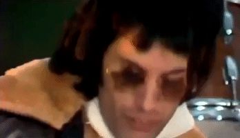 Freddie Mercury Hair Flip GIF by Queen