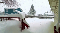 Thick Snow Smothers Porch in Hamburg, New York, as 'Historic' Snowfall Expected